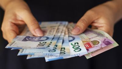 high angle hands holding mexican banknotes
